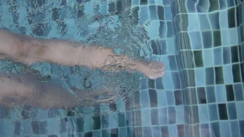Swimming legs slow motion Stock Footage 89754492