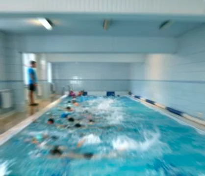 Swimming lessons  with a coach Stock Photos