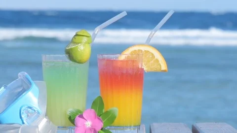 Swimming mask and two alcoholic cocktail on the background of the sea. Stock Footage 83211252