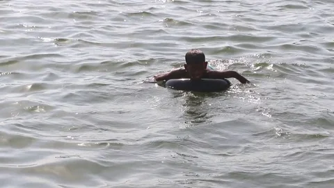 Swimming in Narmada River Stock Footage 75170724