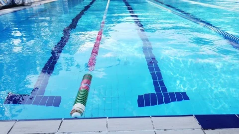 Swimming poll with blue water. View of swimming paths. Stock Footage 115083152