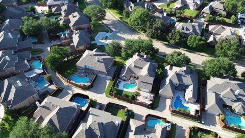 Swimming pool on almost every house at upscale residential neighborhood Stock Footage 282526286
