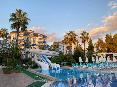 Swimming pool and chila with clear clear blue water in a hotel on vacation .. Stock Photos