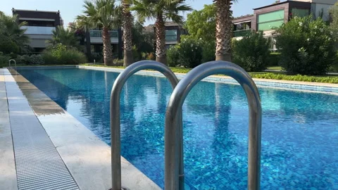 Swimming Pool And Pool Ladder Stock Footage 219955794