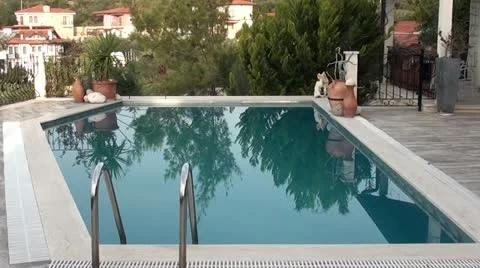 Swimming pool and reflection in water Stock Footage 22034164