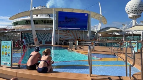 The swimming pool area aboard the Royal Caribbean Independence of the Seas Cr Stock Footage 168706992