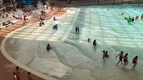 Swimming pool artificial waves West Edmonton Mall Alberta Canada Sept 2019 Stock Footage 116008211