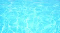 Swimming Pool Background. Sun Reflection in Blue Transparent Water. HD Footage