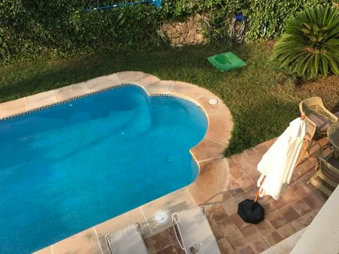 Swimming pool in backyard Foto stock