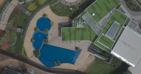 Swimming pool - Bird eye view Aerial Shot on DJI Drone Stock-Footage 90758015