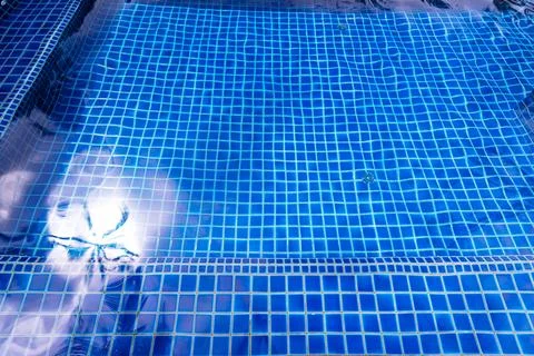 Swimming pool blue texture background. Stock Photos