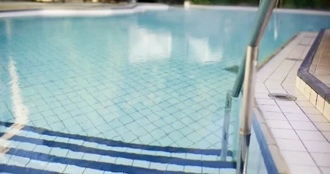 Swimming Pool With Blue Tiles and Steps in Wellness Area Video stock 340261968