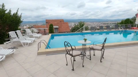 Swimming pool with city view Stock Footage 139986744