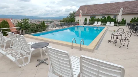 Swimming pool with city view Stock Footage 139986841