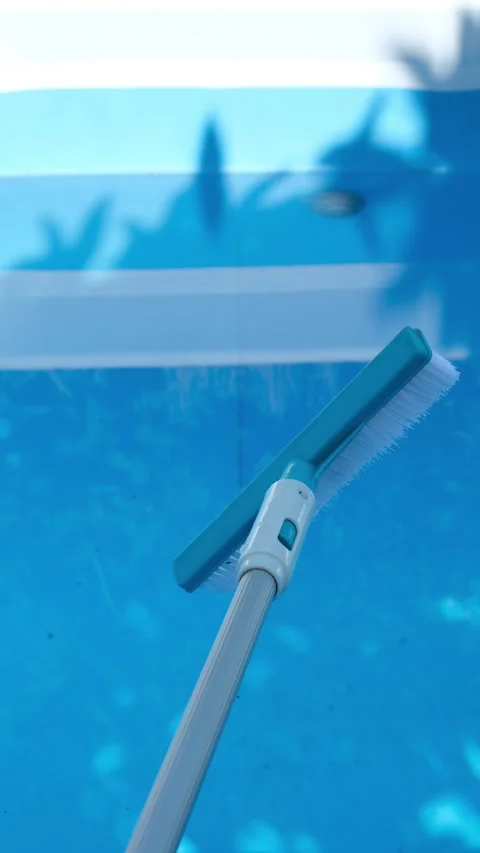 Swimming pool cleaning with brush. Stock Footage 339055276