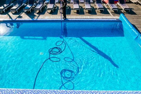Swimming pool cleaning Stock Photos
