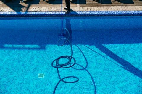 Swimming pool cleaning Stock Photos