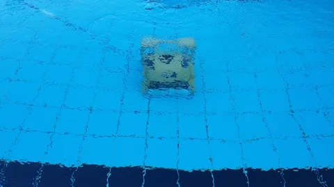 Swimming pool cleaning robot Stock Footage 114646899