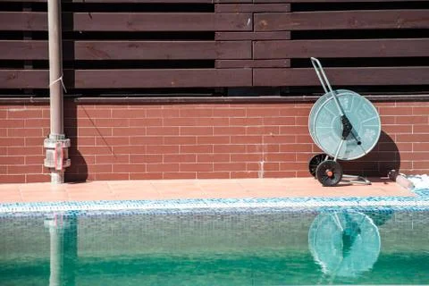 Swimming pool cleaning tools Stock Photos