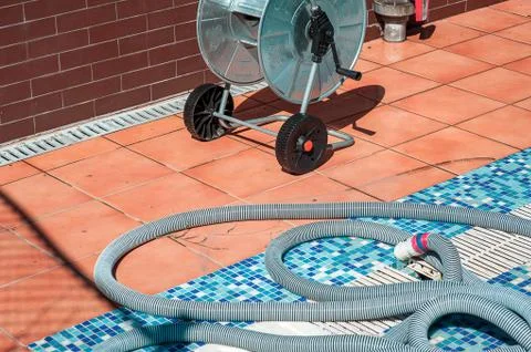 Swimming pool cleaning tools Stock Photos
