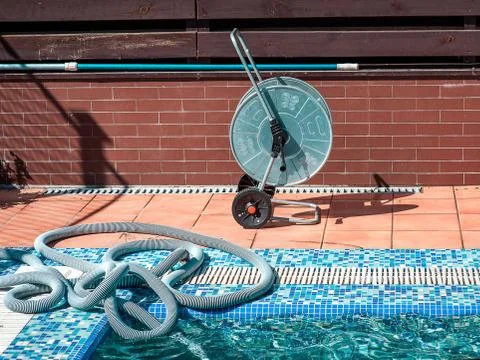Swimming pool cleaning tools Stock Photos