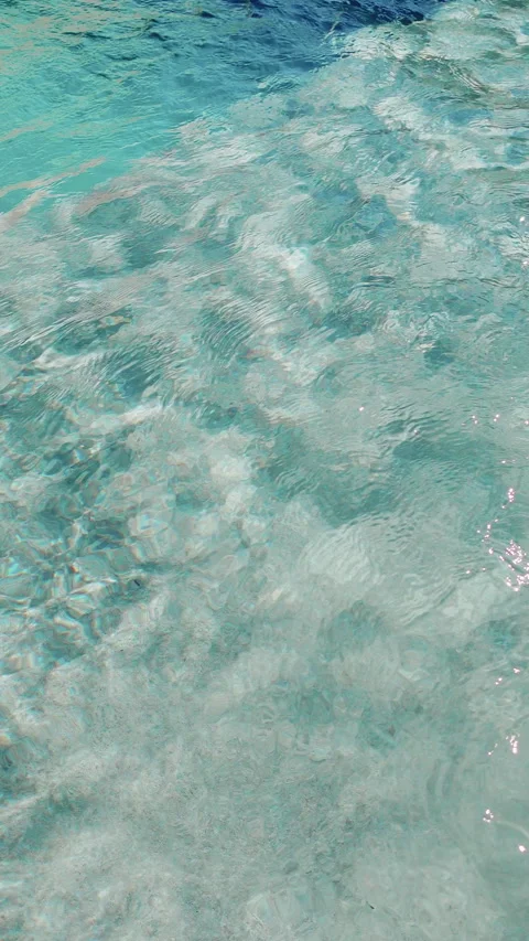 Swimming pool with crystal-clear, clean water where the water moves Видео 280483374