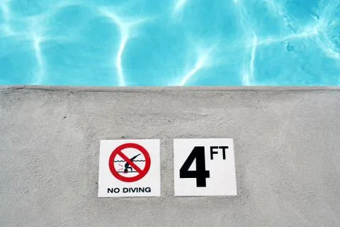 Swimming pool depth marker Stock Photos