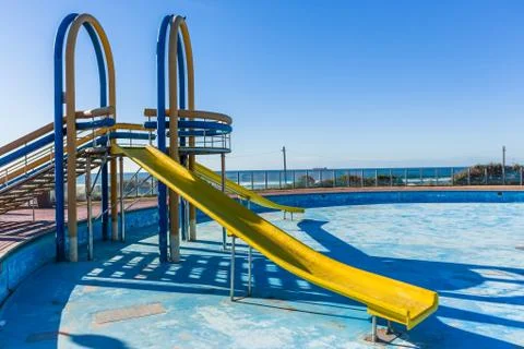 Swimming Pool Dry Water Slide Park Foto stock