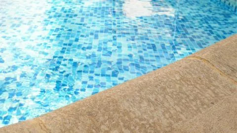 Swimming pool edge Stock Photos