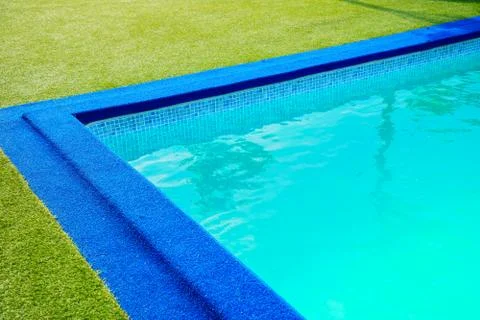 Swimming pool at the edge . Stock Photos