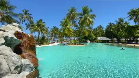 A swimming pool in an exotic environment 4K Stock Footage 279631630