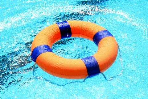 Swimming pool with floatable toys in the water 스톡 사진