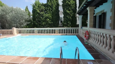 Swimming in the pool Stock Footage 58262821