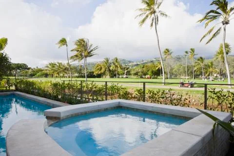 Swimming pool in front of golf course Photos