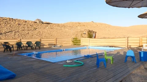 Swimming pool in the heart of the desert Stock Footage 88324403