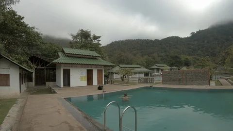 In a swimming pool at hot spring area at Mae Hong Son, Thailand Stock Footage 101242584