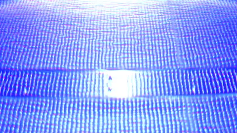 Swimming Pool Illuminated Colors Changing from Purple and Blue to Turquoise Stock Footage 242303317