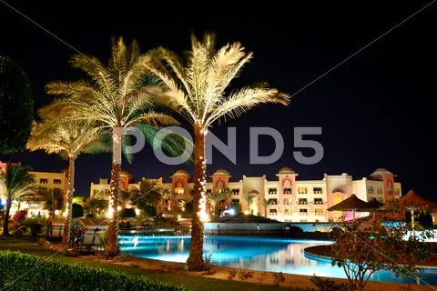 The Swimming Pool At Luxury Hotel In Night Illumination, Hurghada, Egypt