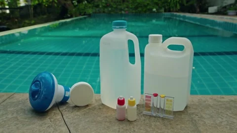 Swimming pool maintenance and cleaning with water treatment kits and chlori.. Stock Footage 334764858