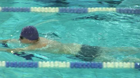 Swimming pool-man calmly flows Stock Footage 12534194