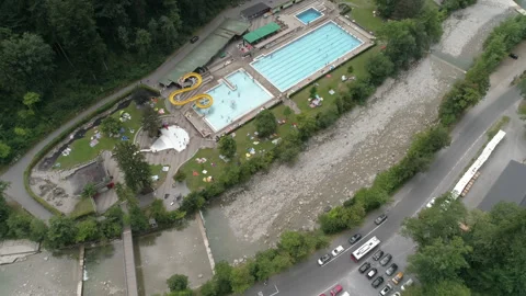 Swimming pool near the forest. Drone view Stock Footage 266887803