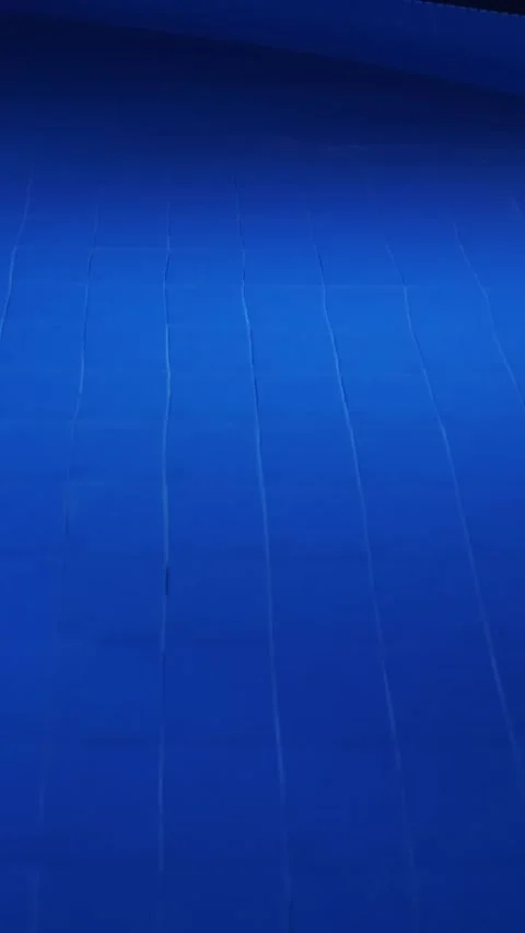 Swimming pool at night. close-up. pool water, blue backlit, at night Stock Footage 317309905