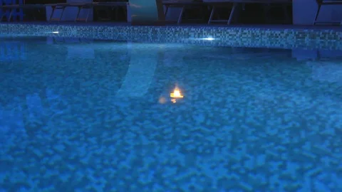 Swimming pool with night illumination that change colors. Outdoor hotel pool Stock Footage