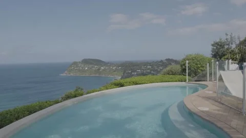 Swimming Pool With Ocean View Overlooking Coastal Hills in Sydney, Australia Stock Footage 345725593