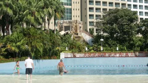 Swimming pool old men young children splash HD 4097 Stock Footage 12581621