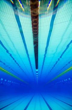 Swimming in a pool Stock Photos