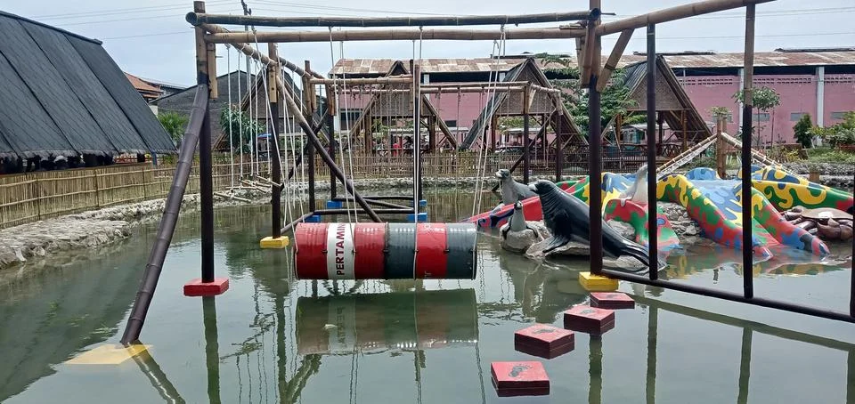 Swimming Pool with Playgrounds Stock Photos