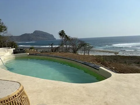 Swimming pool pool by the beach Stock Photos