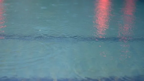 Swimming pool, rain drops Stock Footage 90804517