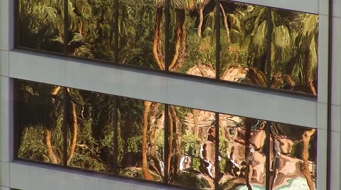 Swimming Pool Reflection in Hotel Windows Stock Footage 47534956